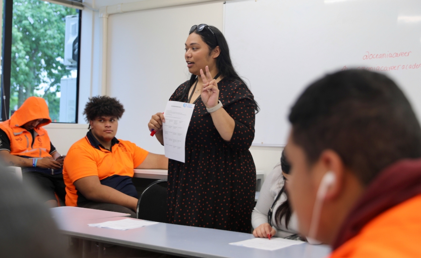 Tutor at front of classroom